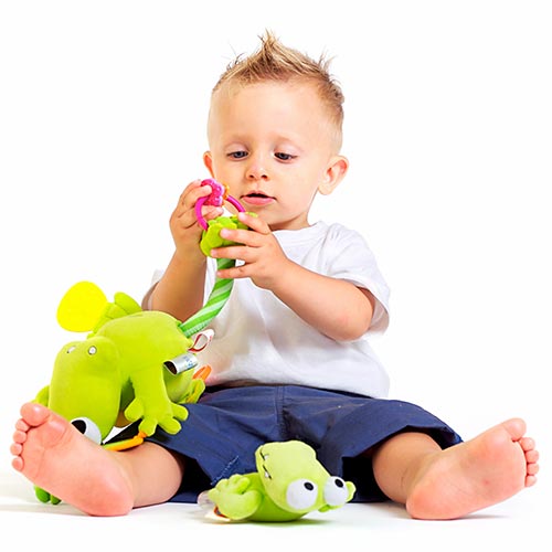 Toddler playing with toys